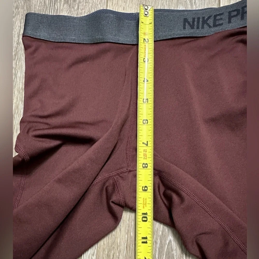 🛍️ NIKE Pro Dri - Fit maroon color with black logo new condition.